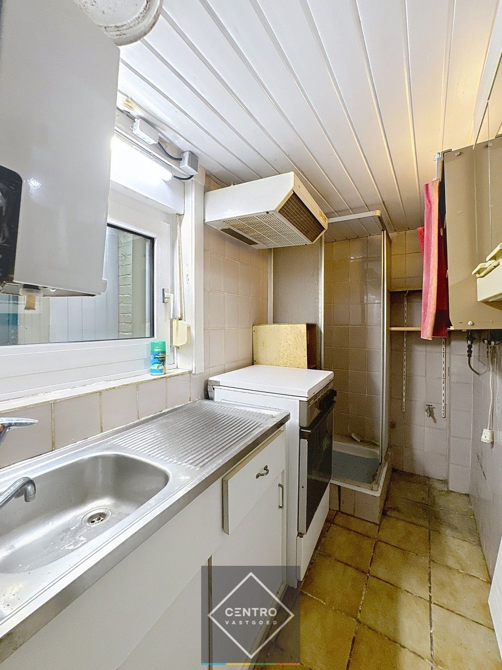 Budgetvriendelijke woning met veel potentieel nabij het centrum! foto 4