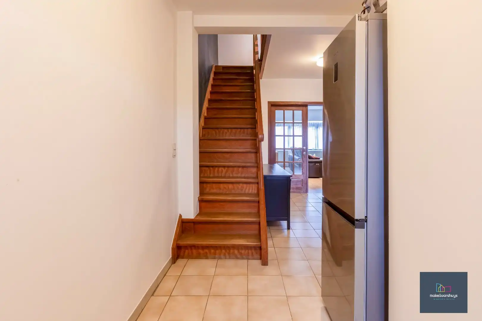 Heel ruime instapklare woning in rij  met zonneterras en 2 staanplaatsen foto 13