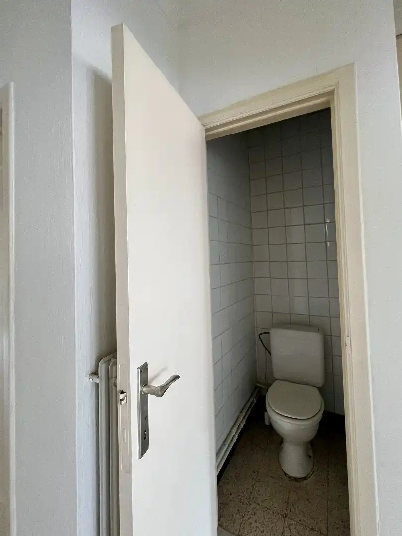 Betaalbaar appartement met twee slaapkamers, kelder en standplaats in hartje Bilzen foto 14