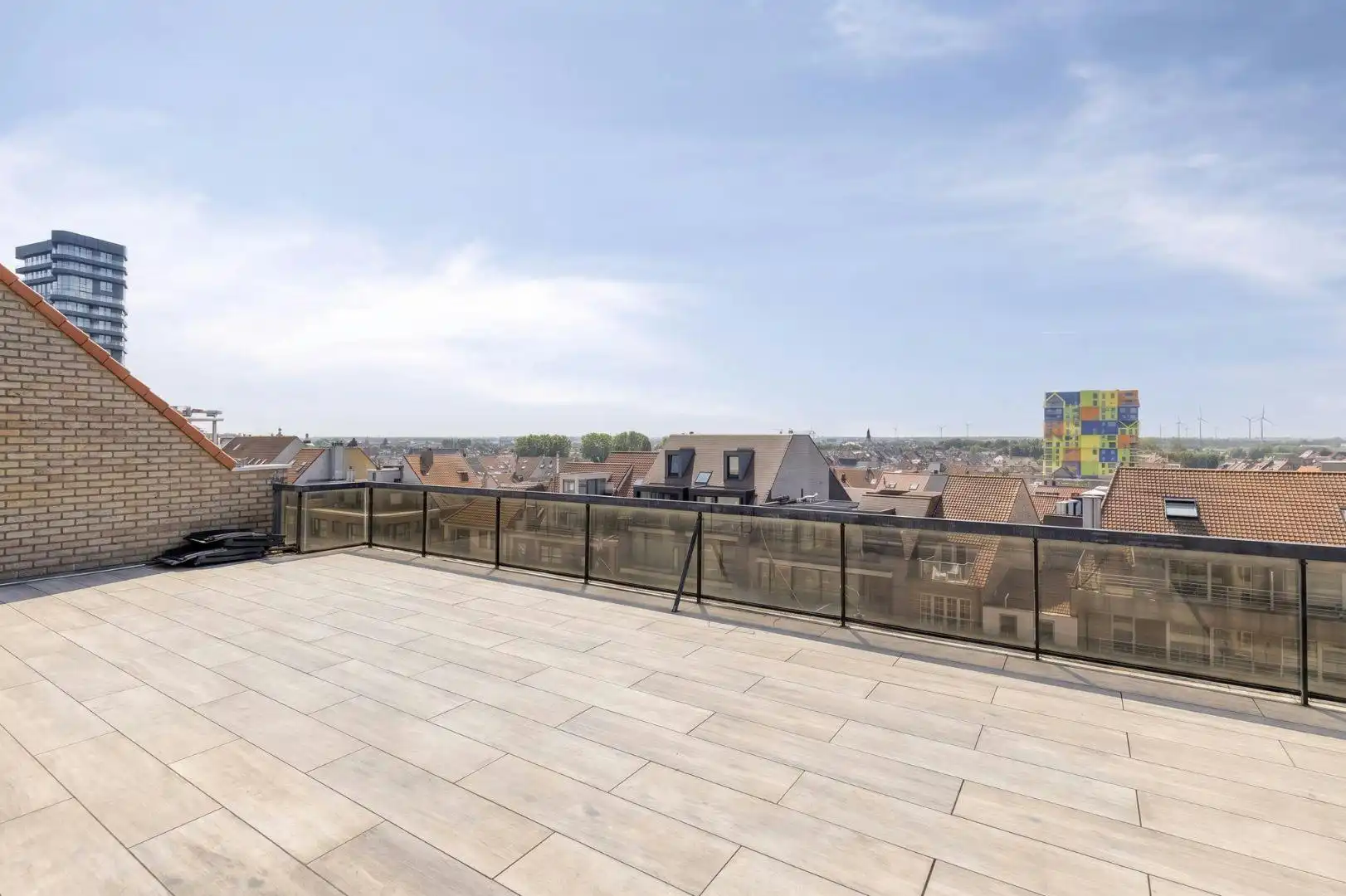 Hoofdfoto van de publicatie: Appartement te koop met  terras vlakbij het strand te Heist