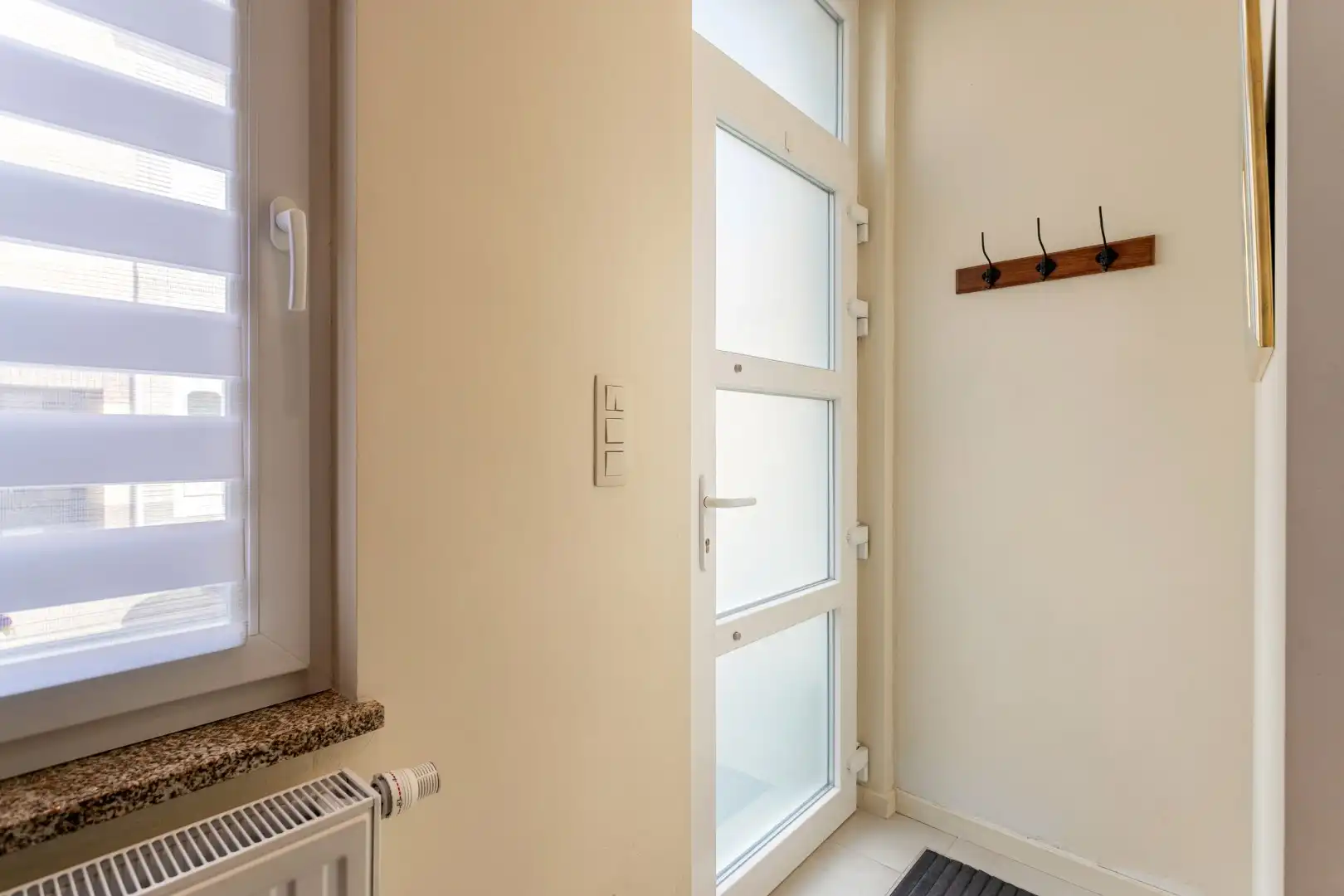 Instapklare woning met tuin te Sint-Pieters-Leeuw foto 2