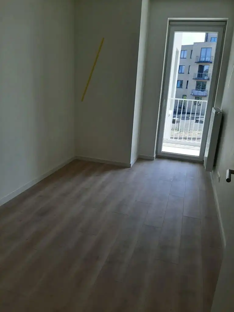 Tweekamerappartement met terras en twee binnenstaanplaatsen foto 4