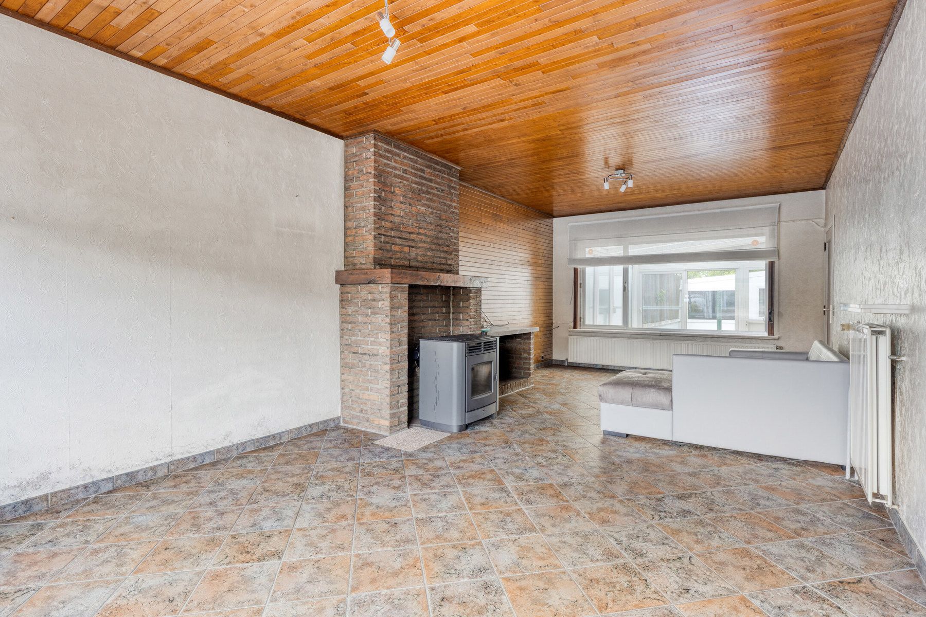 Op te frissen halfopen woning met loods te Affligem foto 2
