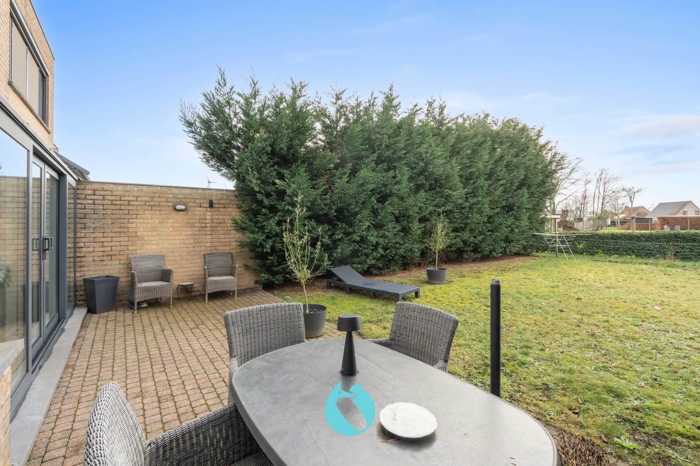 Gelijkvloers appartement met 2 slpks, tuin en garage foto 14