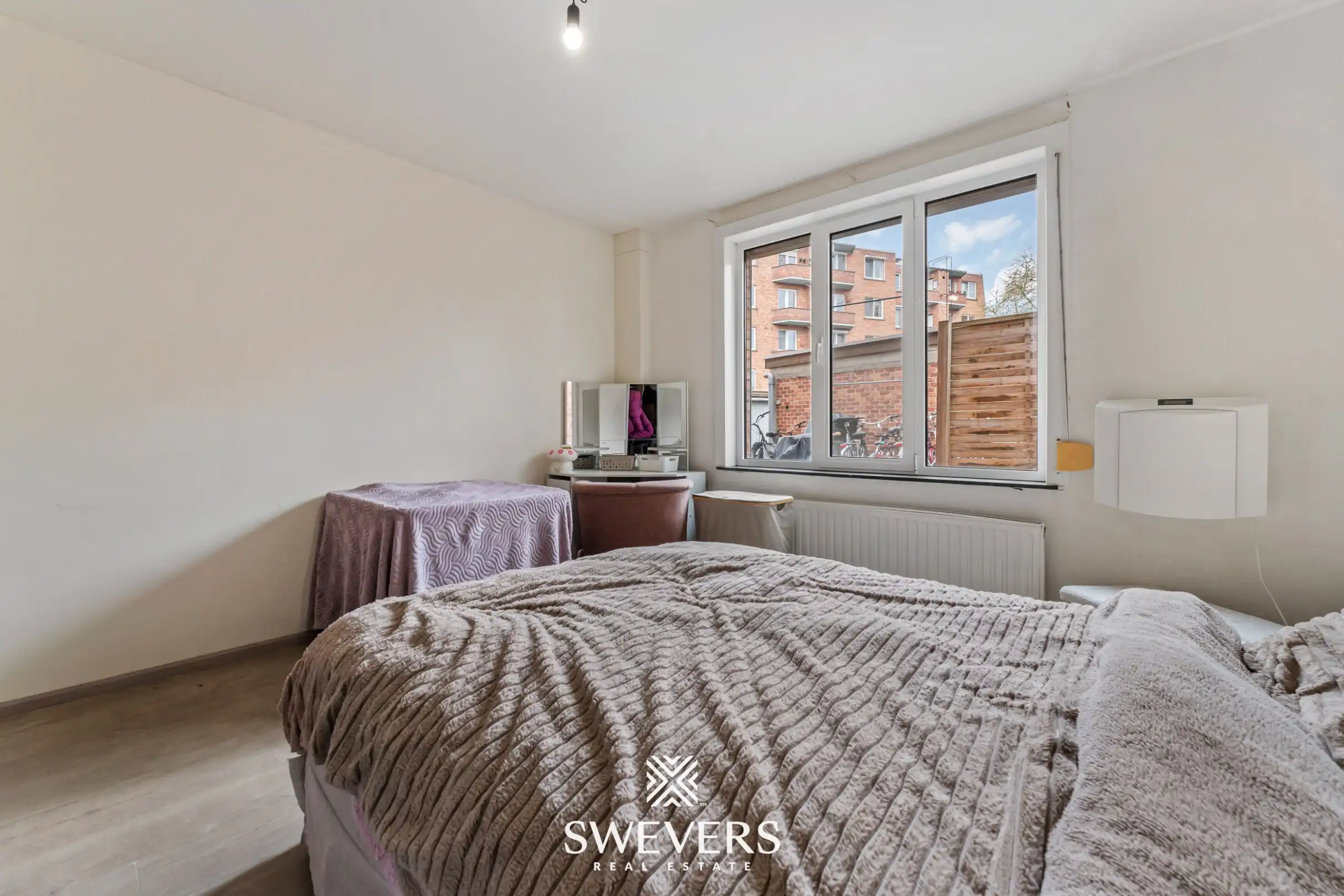 Instapklaar gerenoveerd gelijkvloers appartement met 2 ruime slaapkamers in hartje Hasselt foto 8