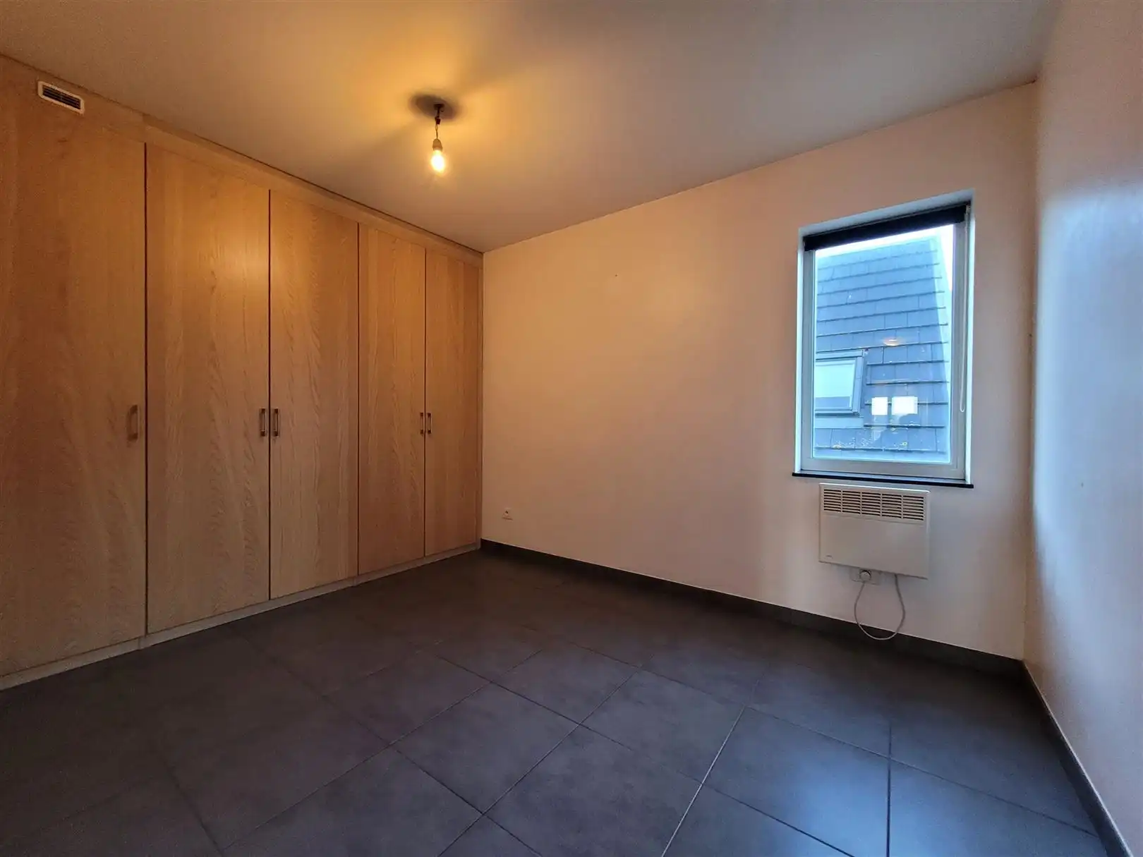 Ongemeubeld appartement met 1 slaapkamer en slaaphoek foto 10