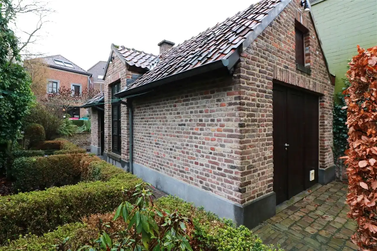 Voormalige patriciërswoning met 3 slpk., prachtige tuin en garage foto 24