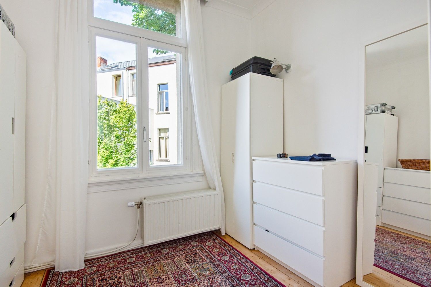 Karaktervol herenhuis met 3 slaapkamers, 2 badkamers, terras en garage. foto 21