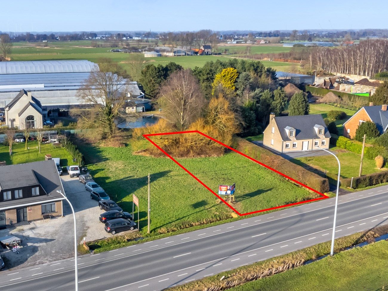 TOP commerciële bouwgrond bij het binnenkomen van Lochristi foto 5