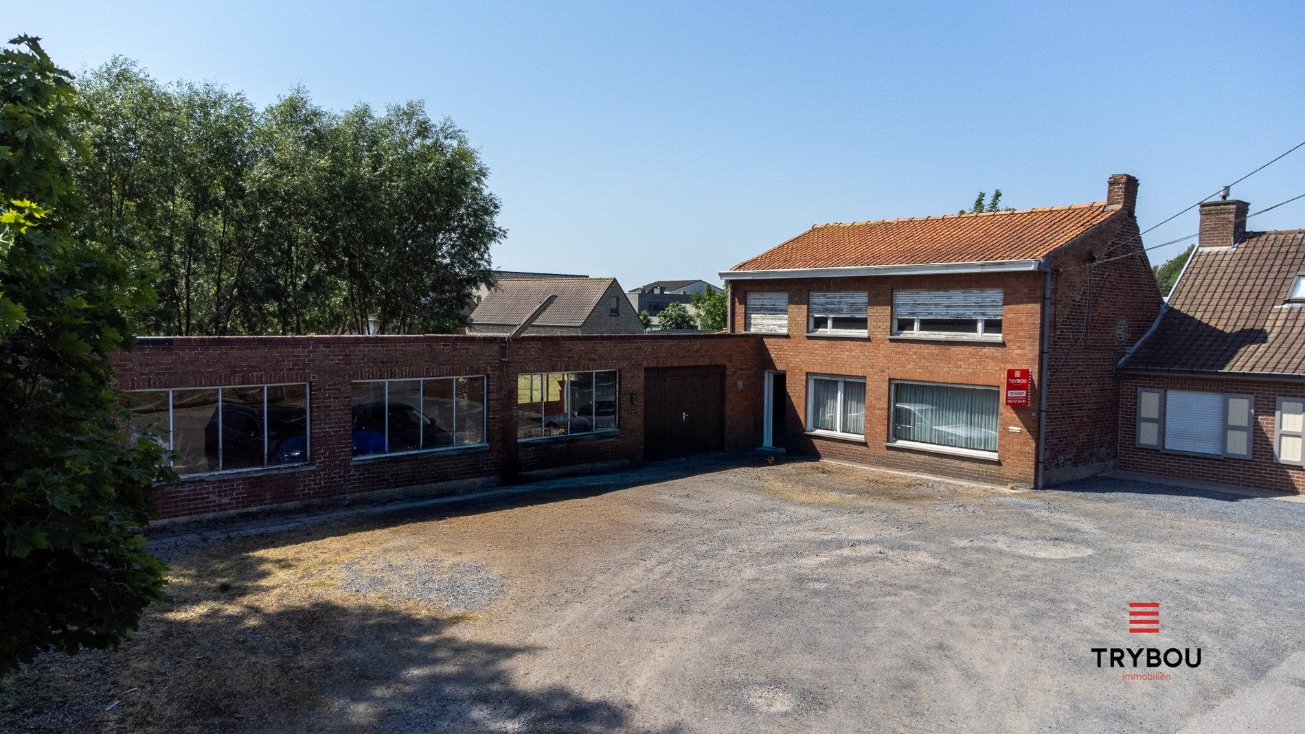 Woning met magazijn op 1203 m² – veel potentieel foto {{pictureIndex}}