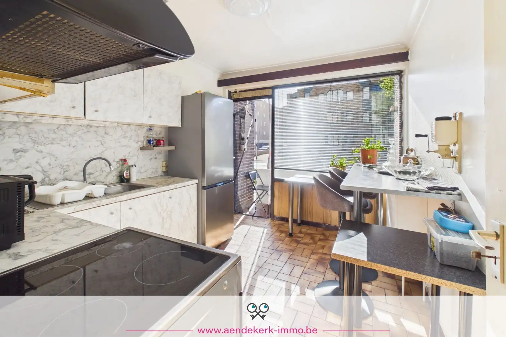 Ruim gelijkvloers appartement met 3 slaapkamers, garage en kelderberging foto 6