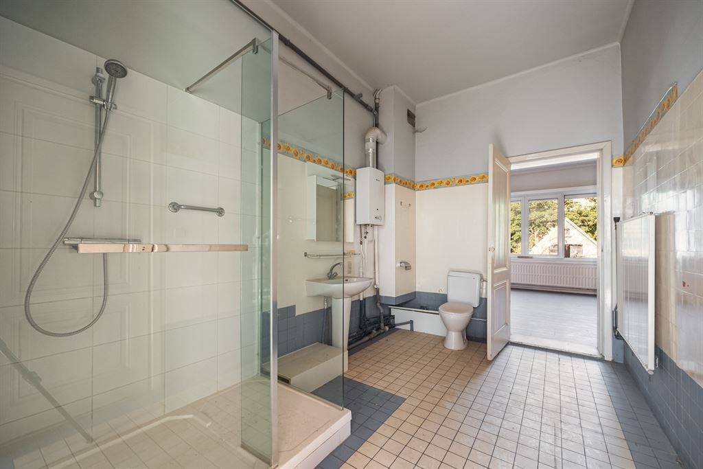 Woning met gigantisch magazijn te renoveren foto 12