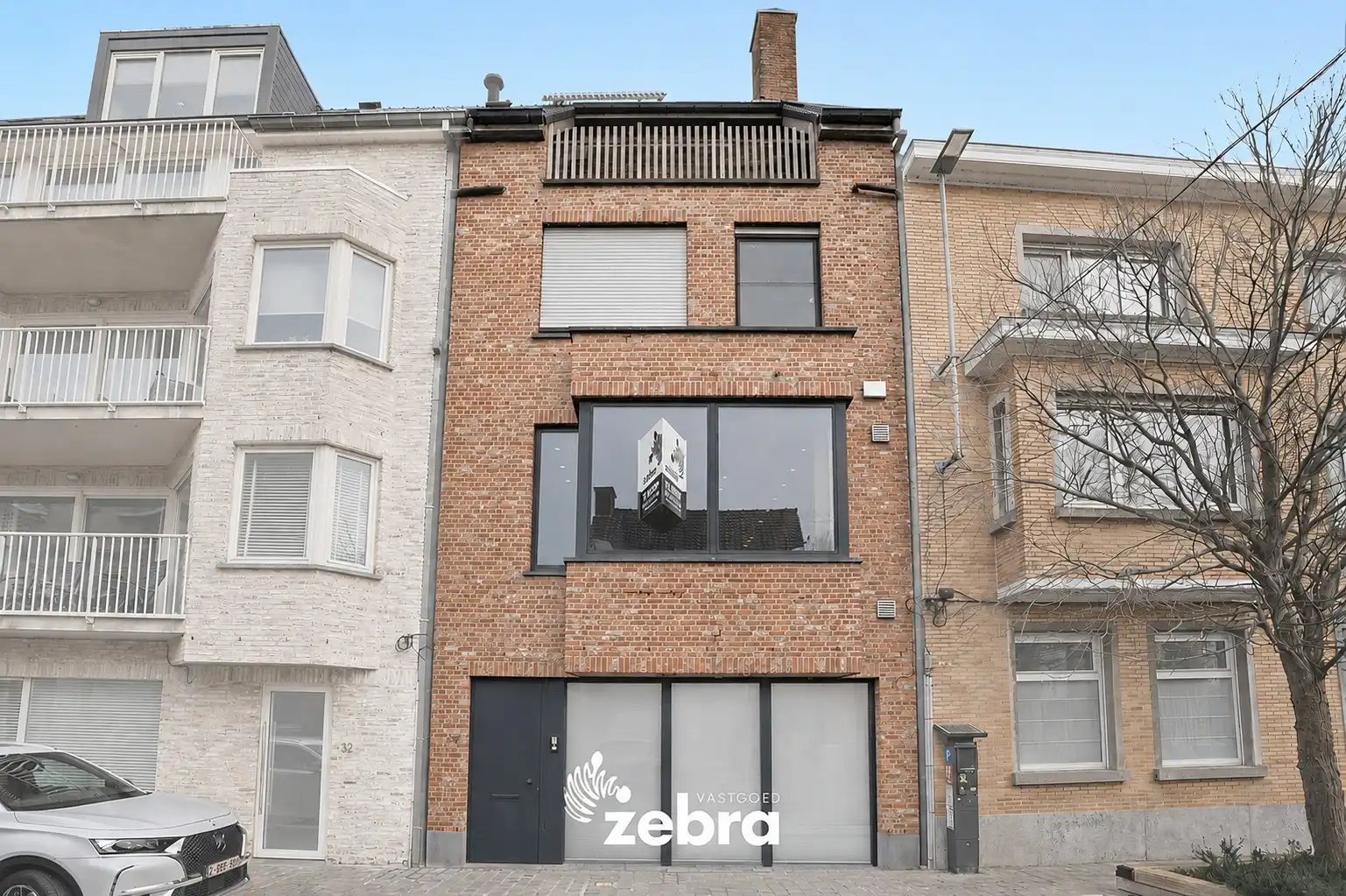 Eigentijdse woning met lift, terras en topafwerking in het centrum van Roeselare! foto 2