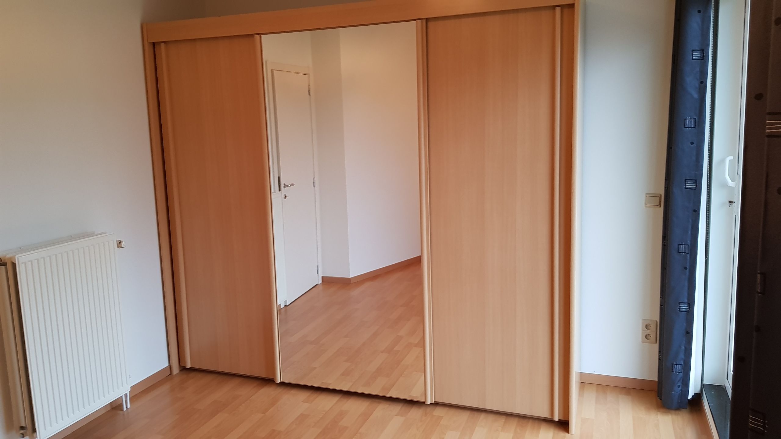 Modern gelijkvloers appartement te huur in Leuven foto 12