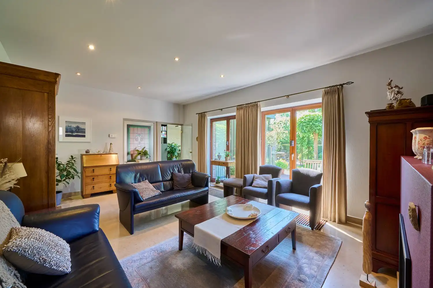 Karaktervolle energiecorrecte vrijstaande woning met praktijkruimte, 4/5 slaapkamers en zuidgerichte parktuin foto 6