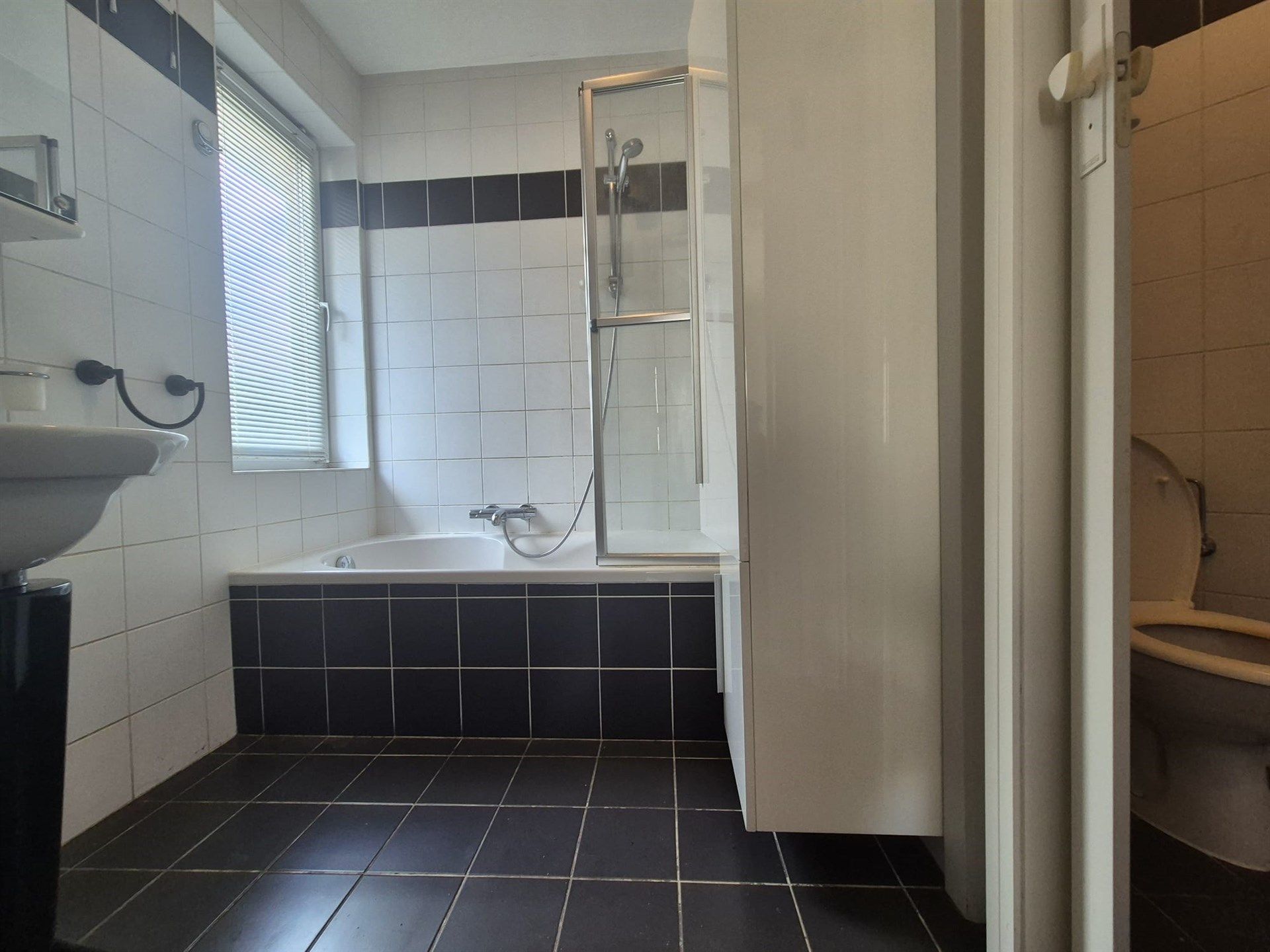 Gunstig gelegen gelijkvloers 1-slaapkamerappartement in Heusden foto 20