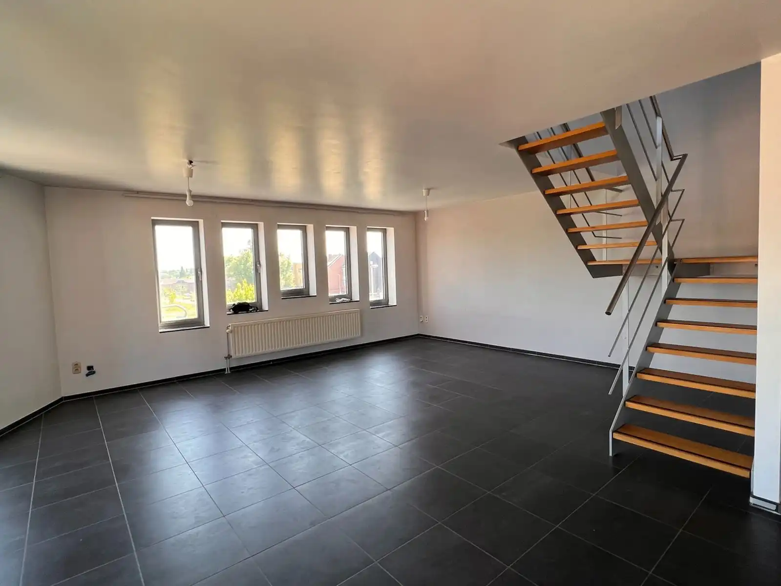 Ruim 2 slaapkamer duplex appartement te huur in Leuven foto 5