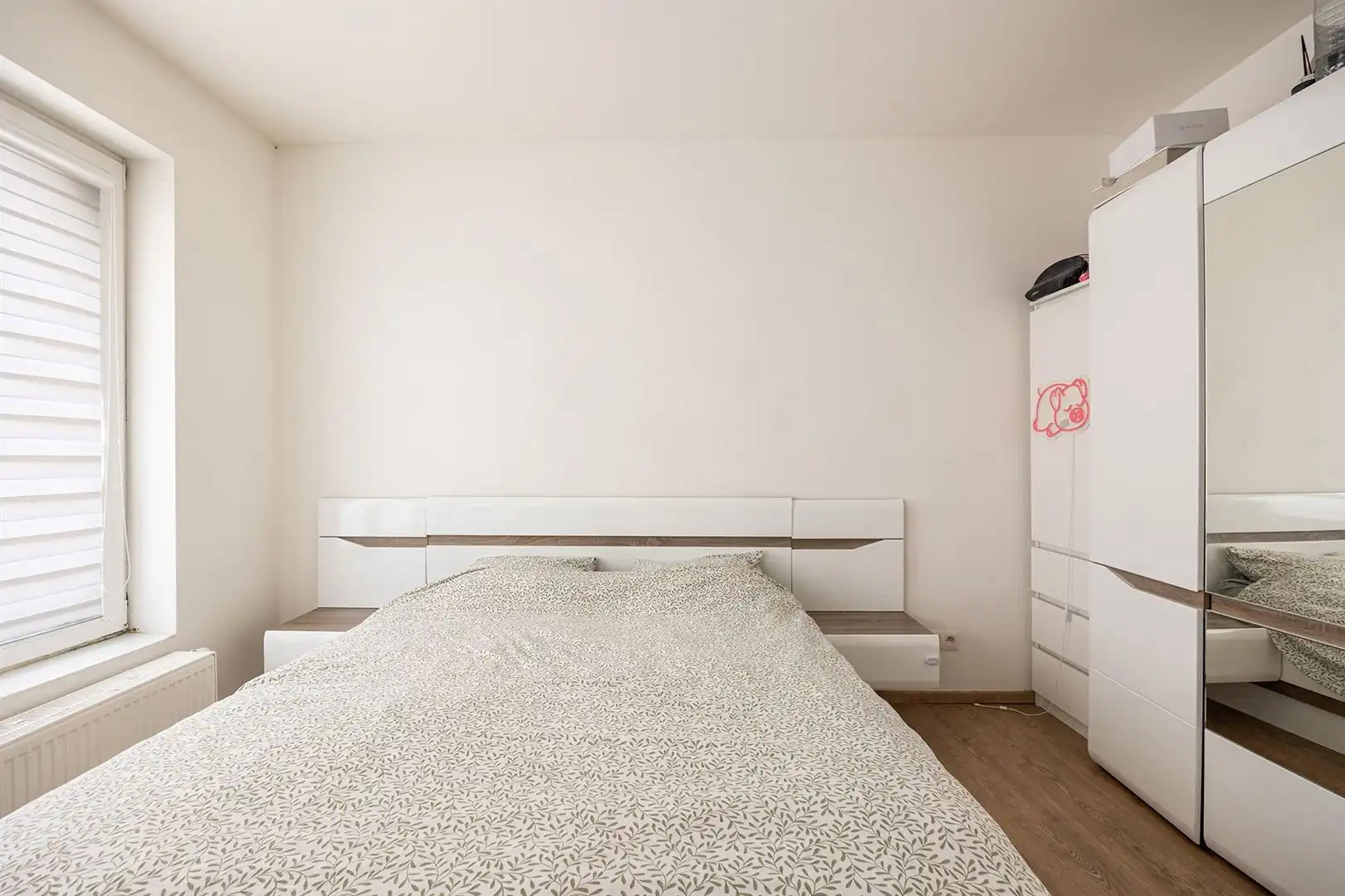 Tussen twee parken: licht appartement met tuin en garage foto 14