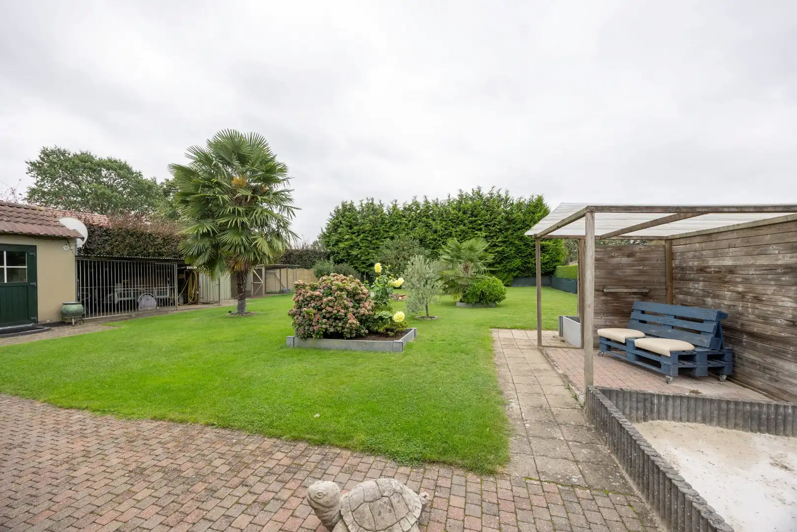 Goed onderhouden woning op een perceel van 8 are 19 ca foto 23