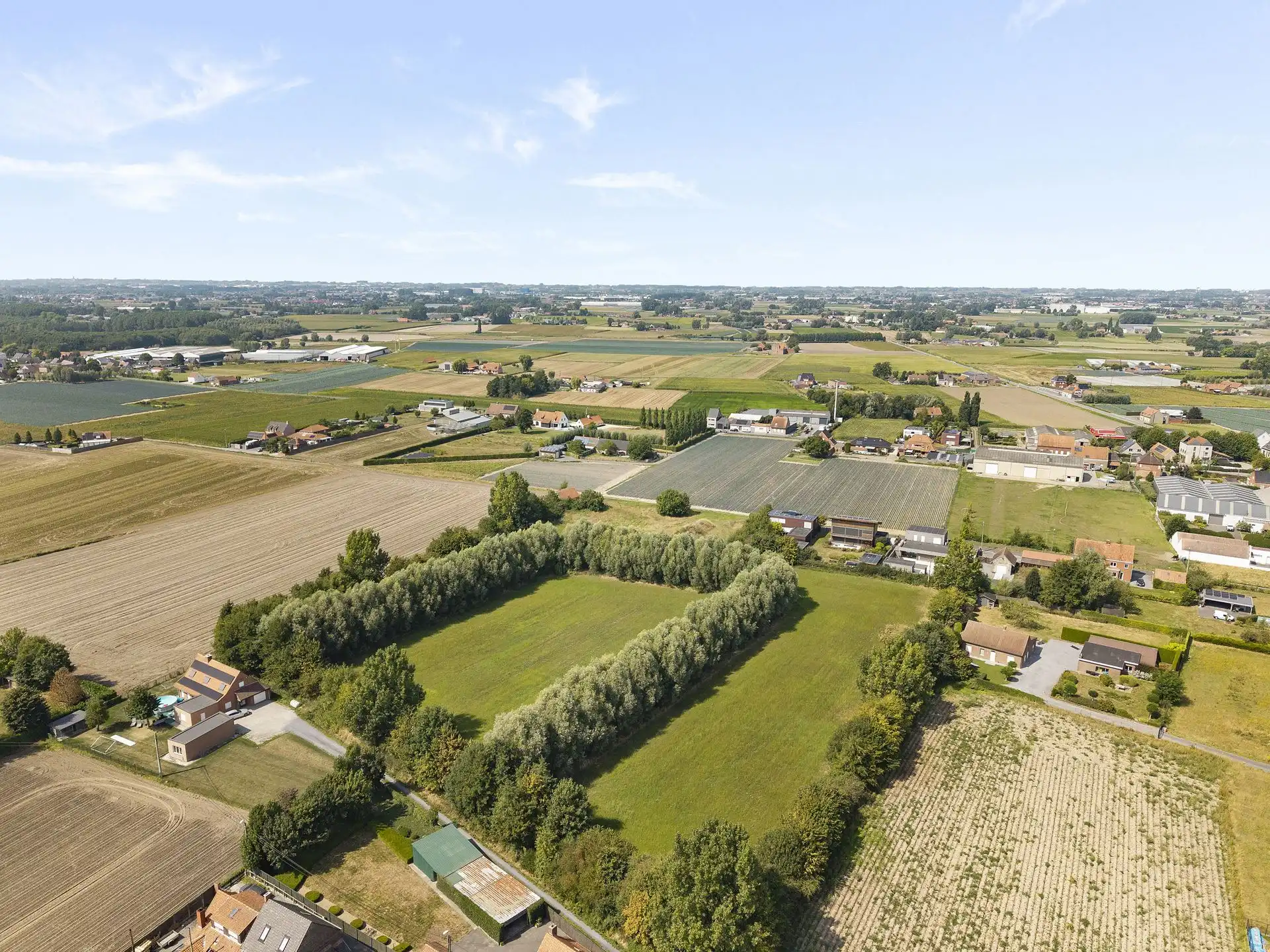 Unieke bouwgrond van 3300m2 + 2 hectare omheinde weide/tuin foto 8