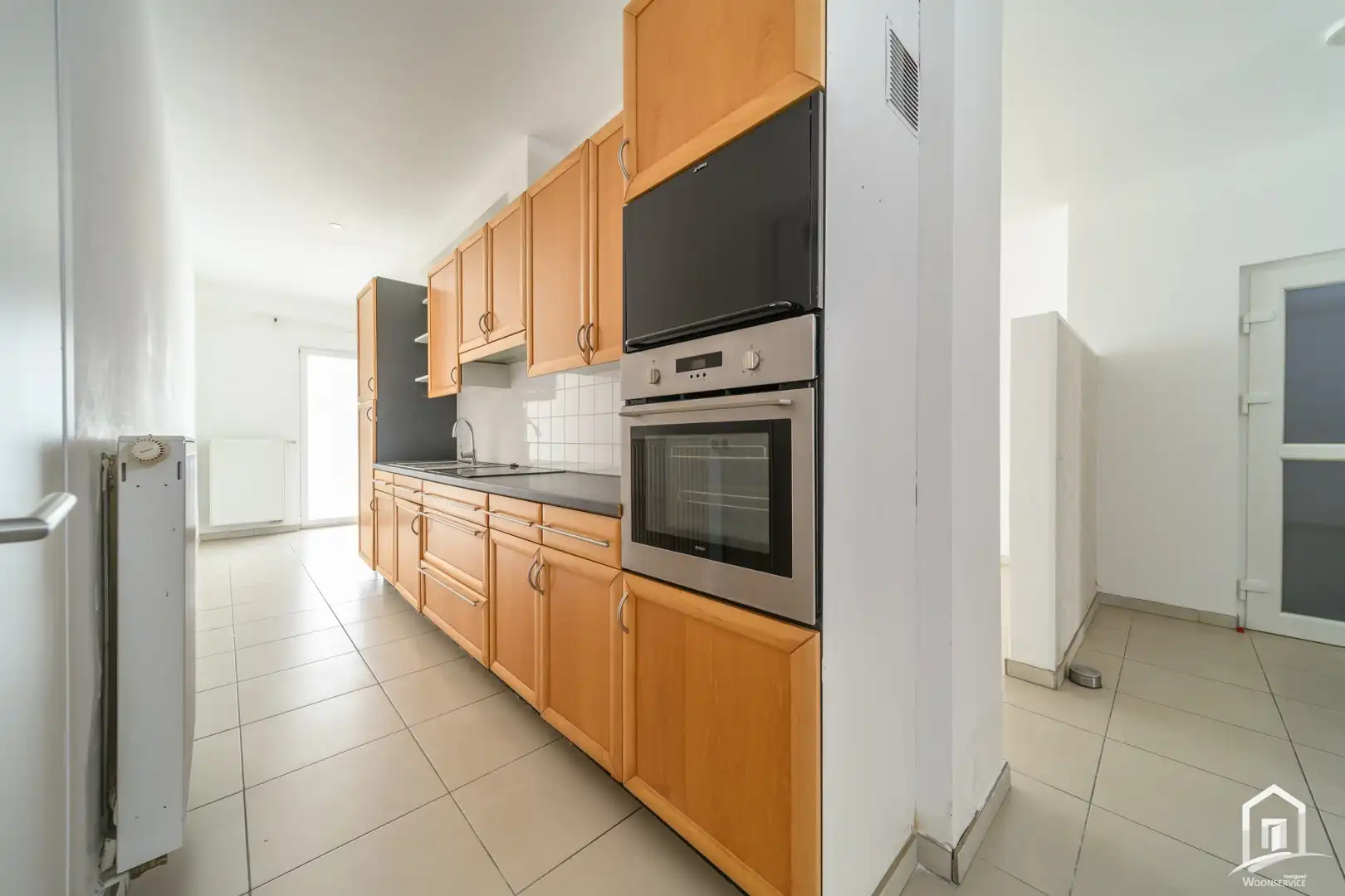UNIEKE INVESTERING: 2 INSTAPKLARE GELIJKVLOERSE APPARTEMENTEN MET TERRAS EN STAANPLAATS foto 9