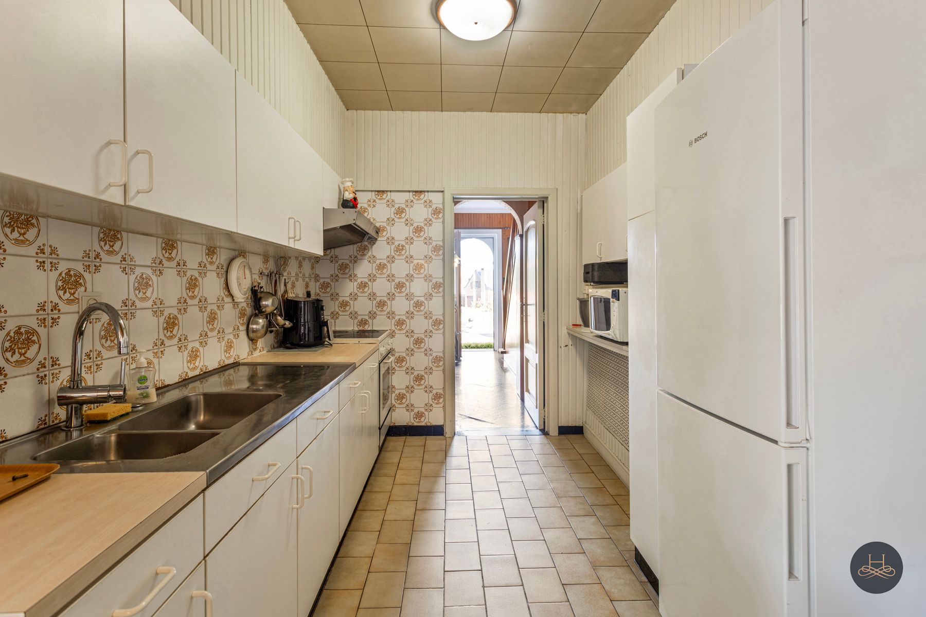 Karaktervolle en ruime halfopen woning met leuke tuin foto 11