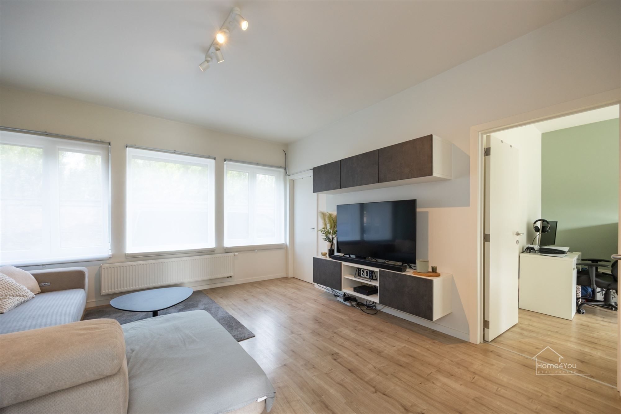Gelijkvloers appartement met zeer grote tuin foto 2