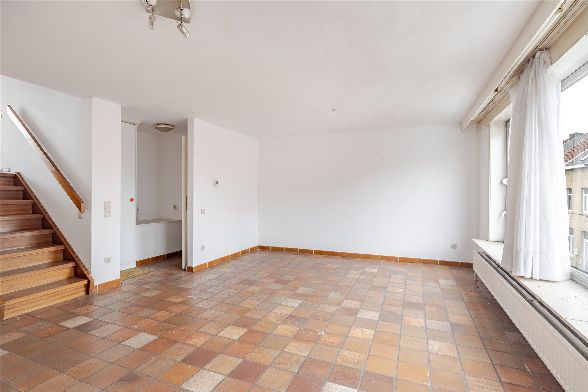 Opbrengsteigendom bestaande uit 2 appartementen + 2 gelijkvloerse autostaanplaatsen foto 14