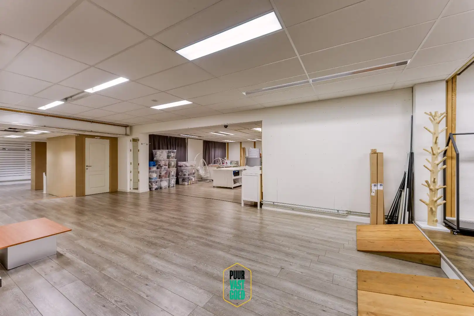 Riant appartement en studio boven grote handelsruimte  foto 6