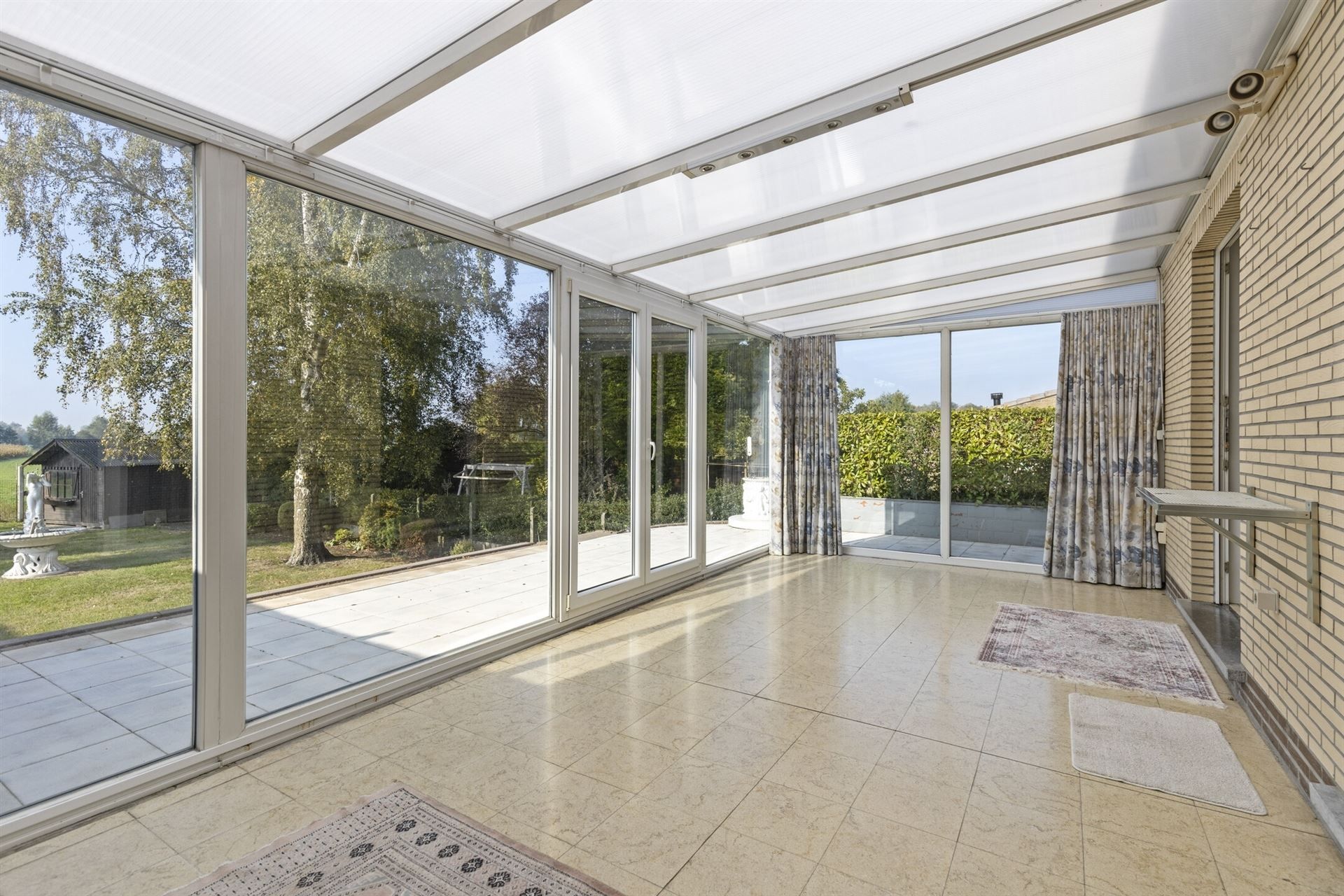 Woning met grote tuin, 3 slpks., veel licht en grote garage. foto 10