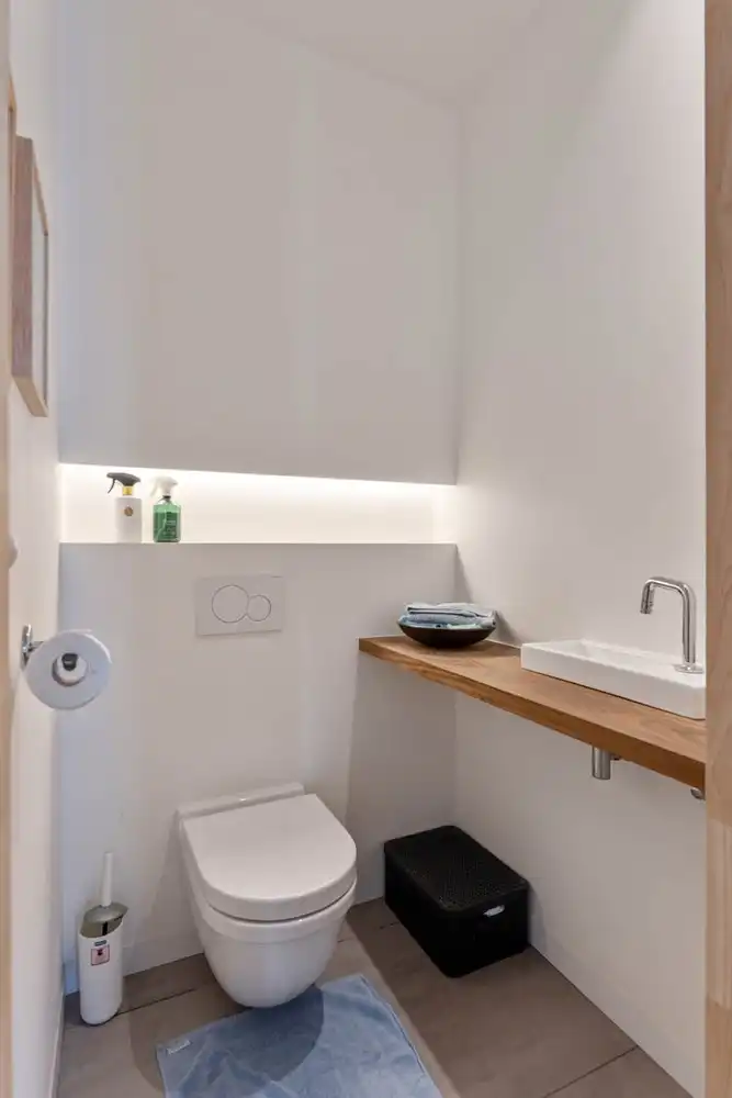 Gerenoveerde en energiezuinige(B-label) woning met 3 slaapkamers, 2 badkamers, een dressing, een garage met een oprit en een tuin nabij het station van Leuven! foto 3