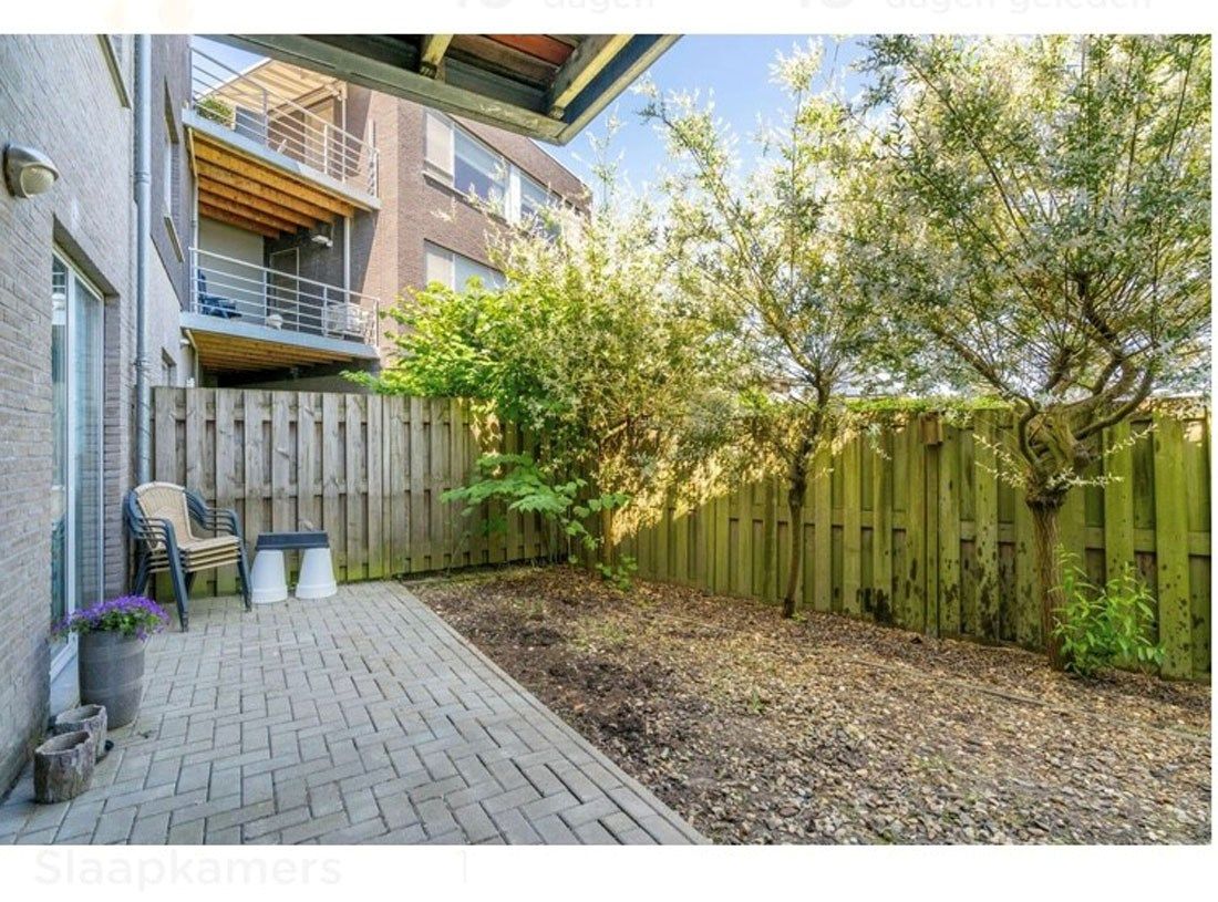 Knus gelijkvloers appartement met leuk zonneterras en tuintje foto 8