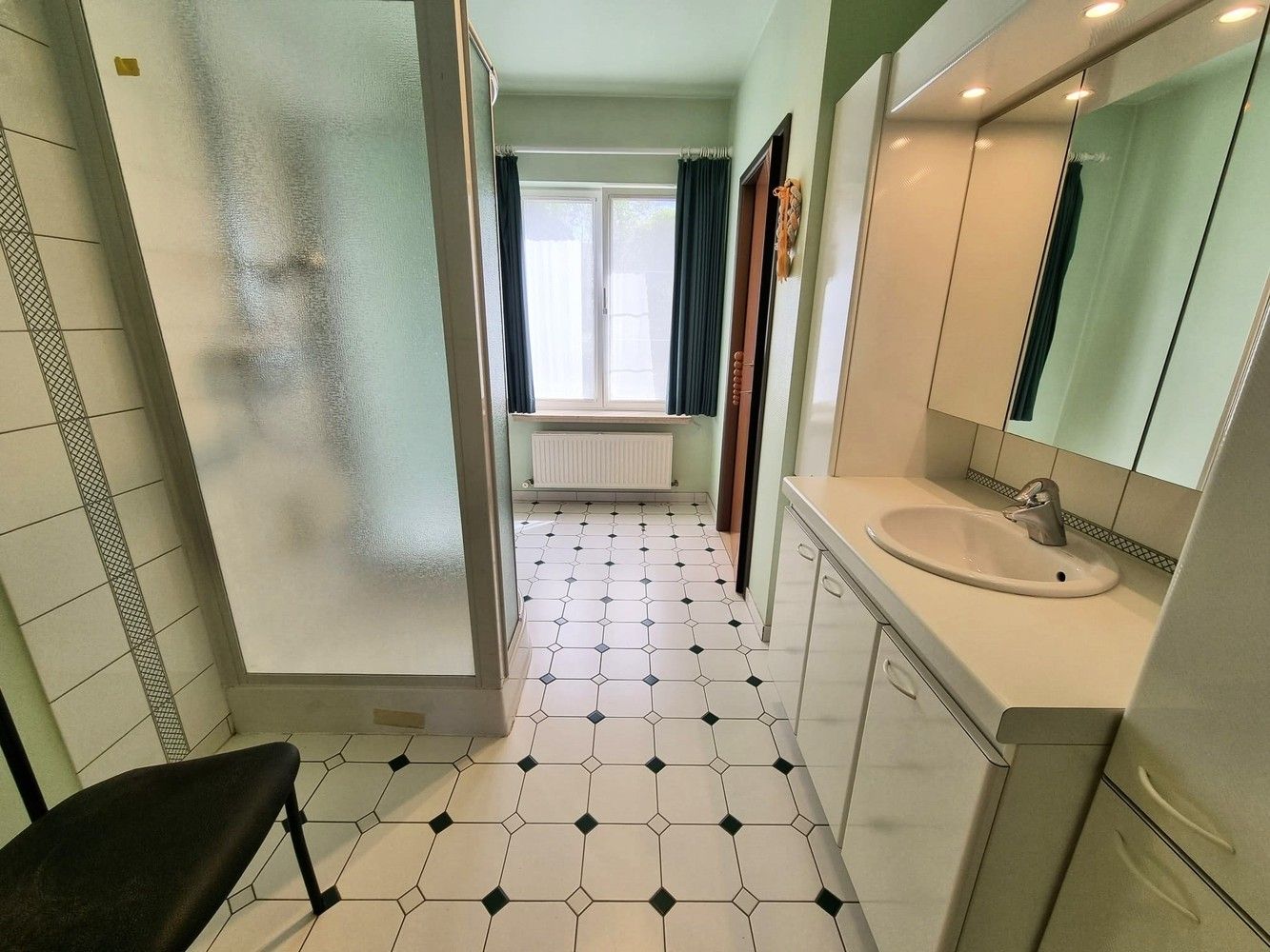 Woning met praktijk- of handelsmogelijkheden in het centrum van Ramsel foto 10