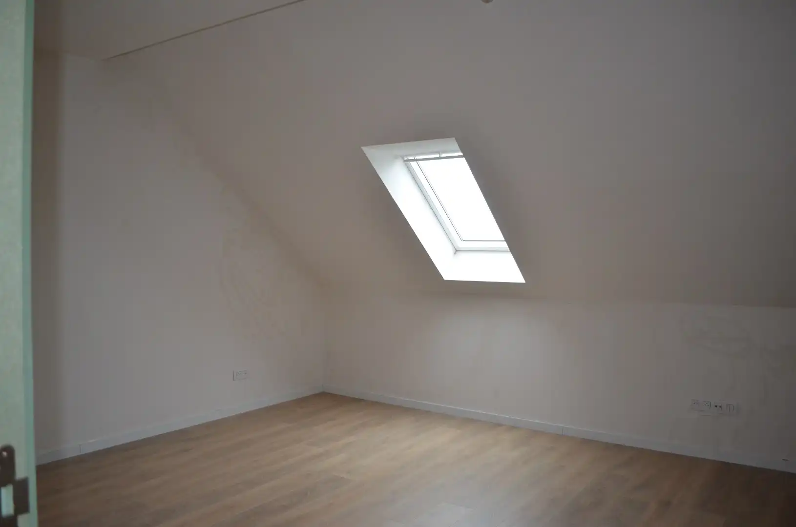 Recent duplex-appartement met twee slaapkamers, groot terras en autostaanplaats in het centrum. foto 9