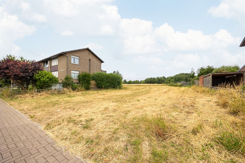 Bouwgrond OB met zicht op velden en avondzon foto 4