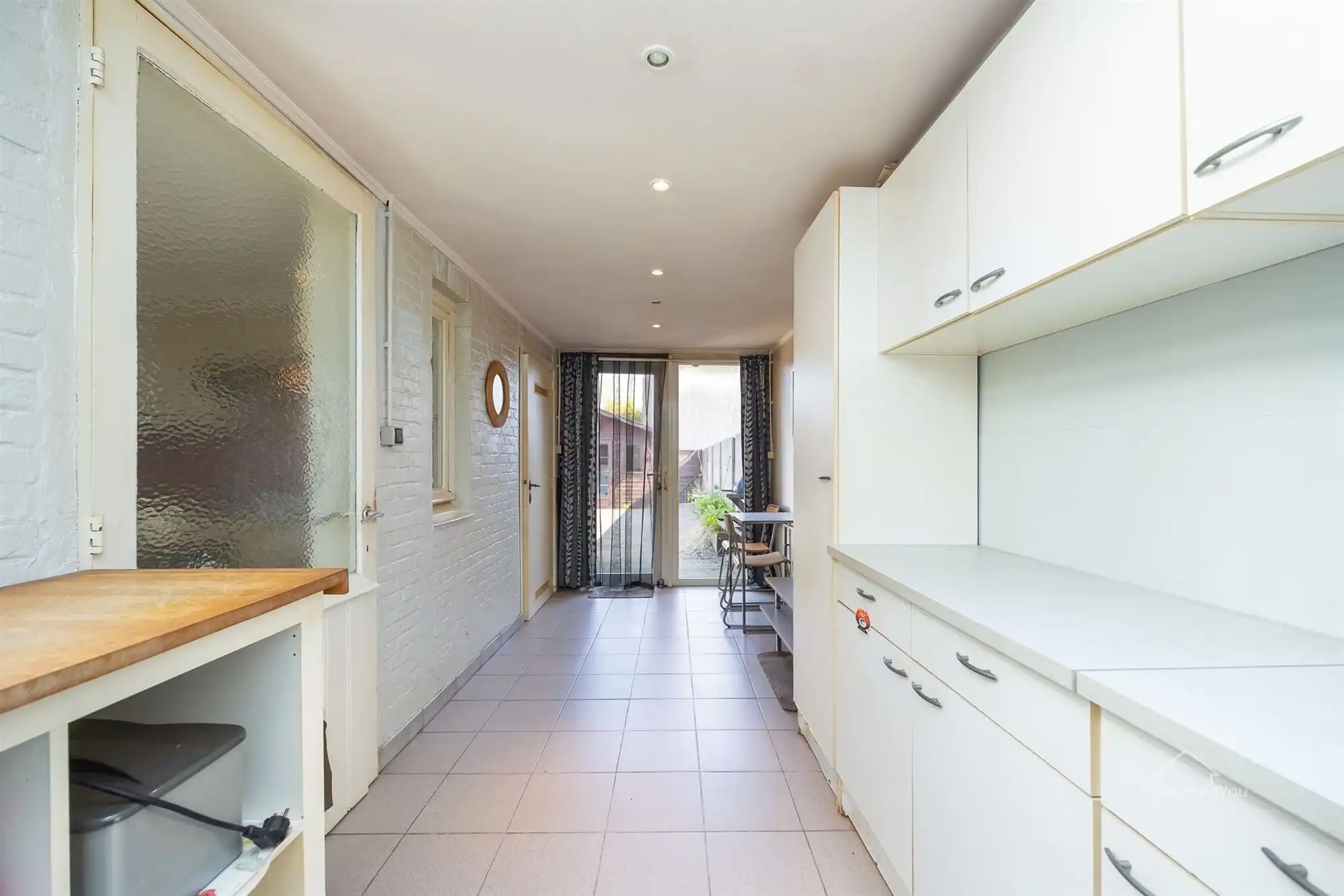 Te renoveren rijwoning met tuintje foto 6