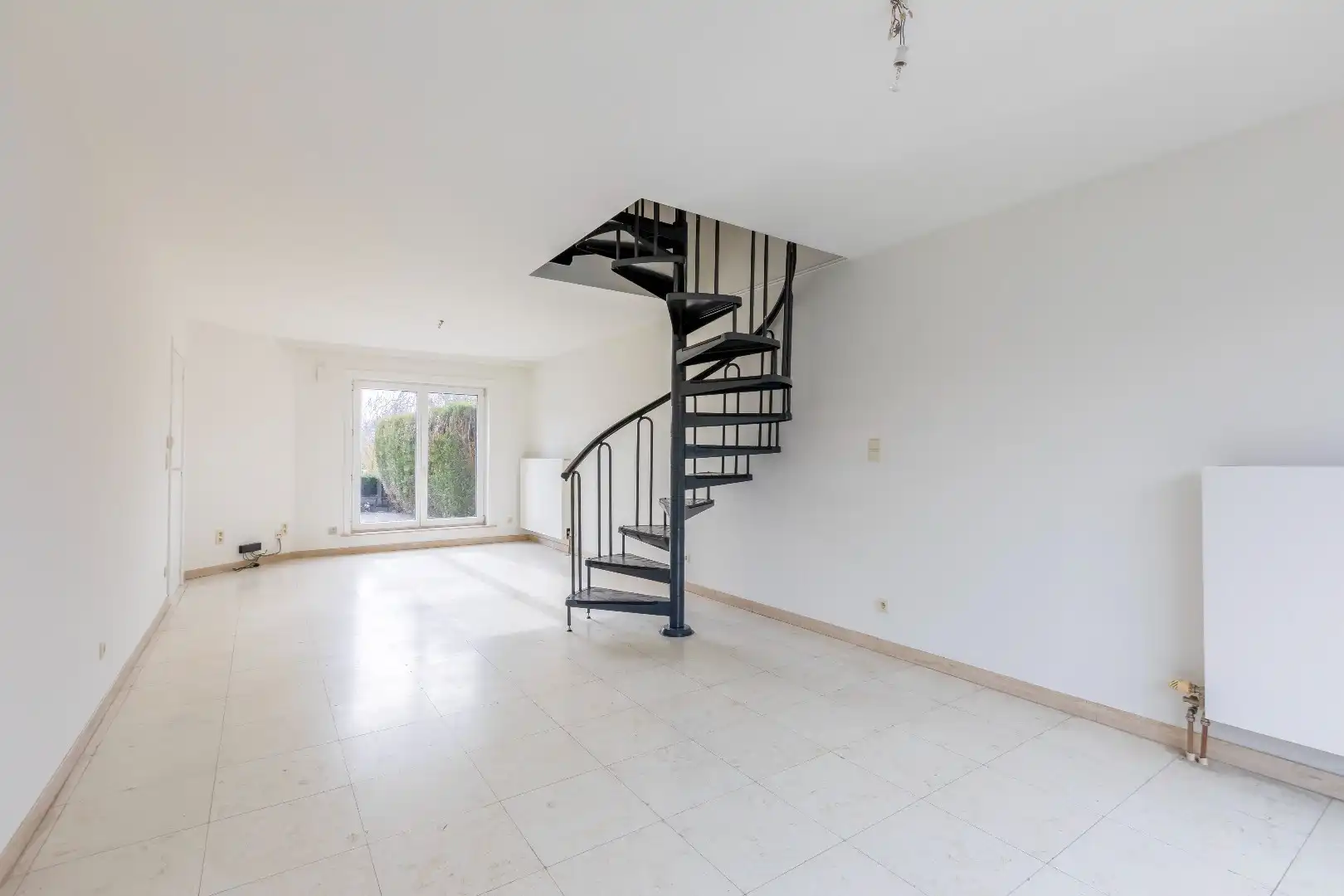 Gunstig gelegen instapklare woning in rij met garage en toffe tuin foto 6
