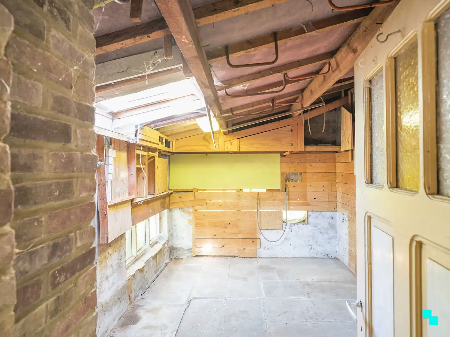 Te renoveren woning met gezellige tuin in het hart van Merelbeke foto 8