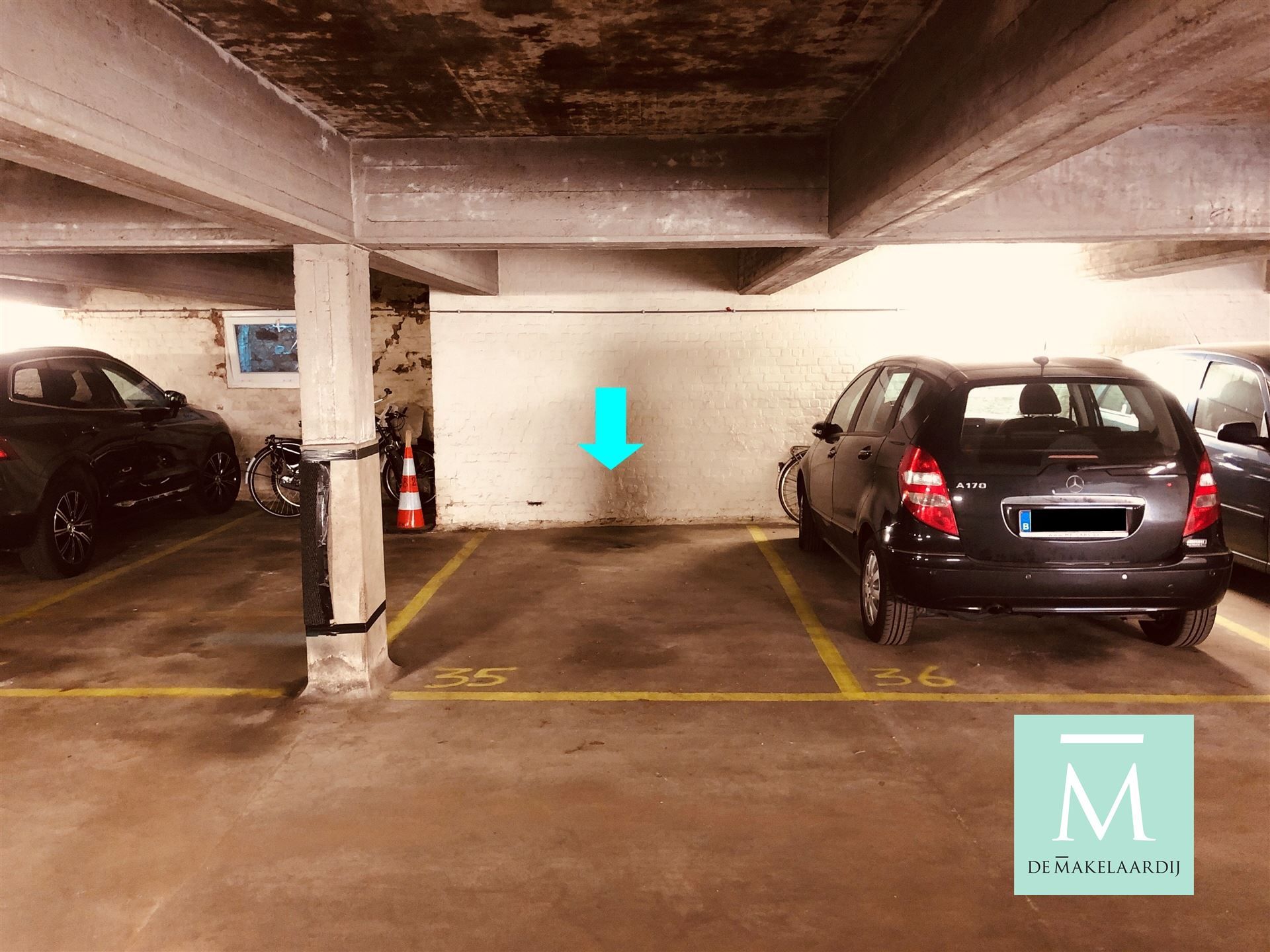 Centraal gelegen garagebox evenals twee ondergrondse autostaanplaatsen te koop:  foto 8