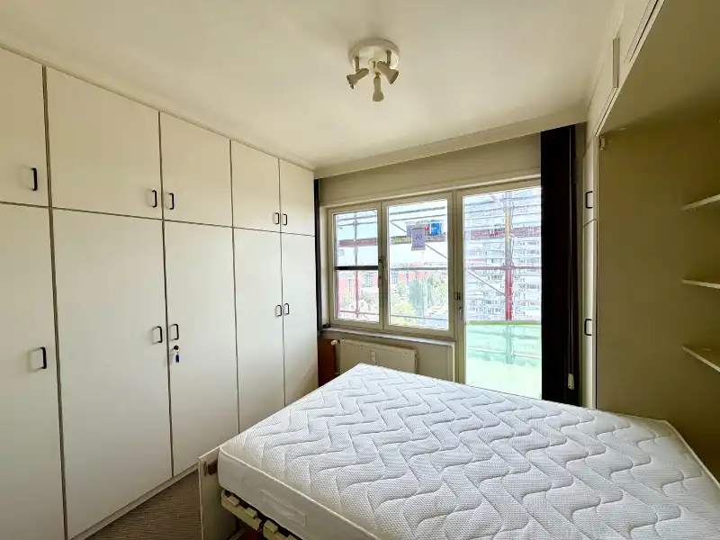 RUIM EN LICHTRIJK APPARTEMENT MET ZONNIG TERRAS EN UNIEK UITZICHT OVER GENT foto 13