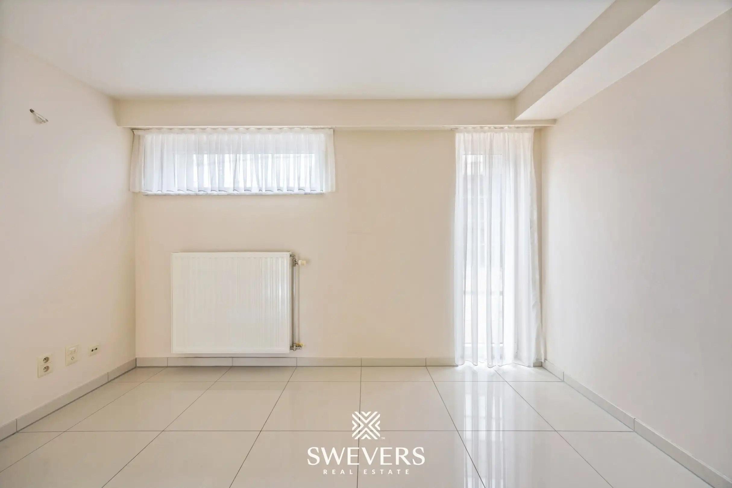 Uitstekend gelegen gelijkvloers appartement met 2 slaapkamers en private tuin foto 16
