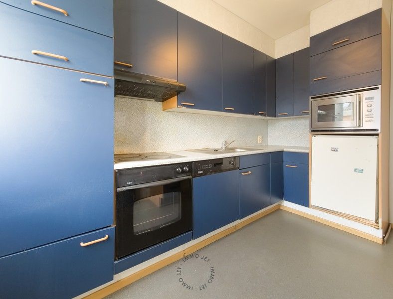 Lichtrijk twee-slaapkamer appartement inclusief garage in hartje Beveren foto 5
