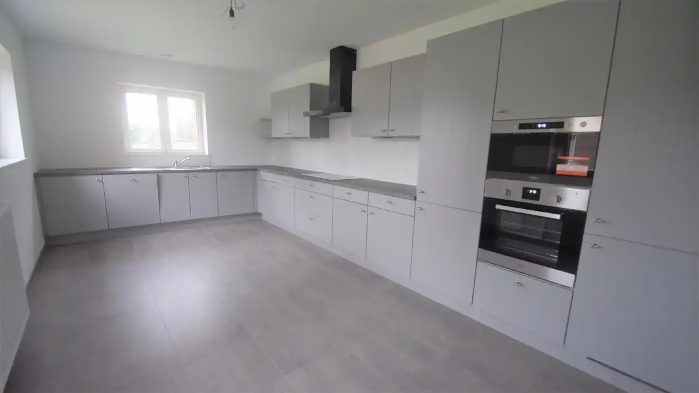 Zeer recente woning met 3 ruime slpks, tuin en terras foto 4