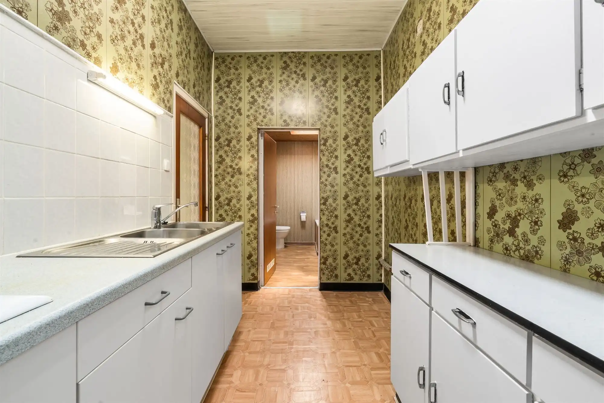 Woning met verrassend grote tuin, te renoveren foto 8