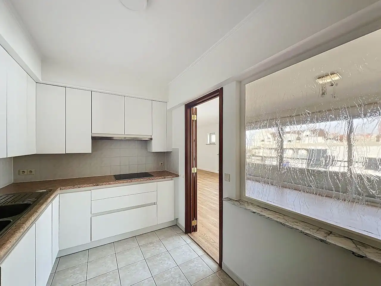 Ruim en functioneel appartement met drie slaapkamers vlakbij het Vissershuldeplein te Heist foto 13