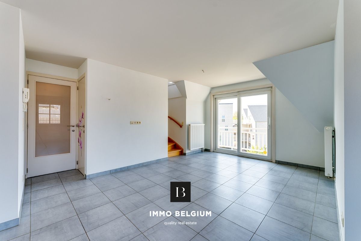 Ruim duplex appartement met 3 slaapkamers foto 4
