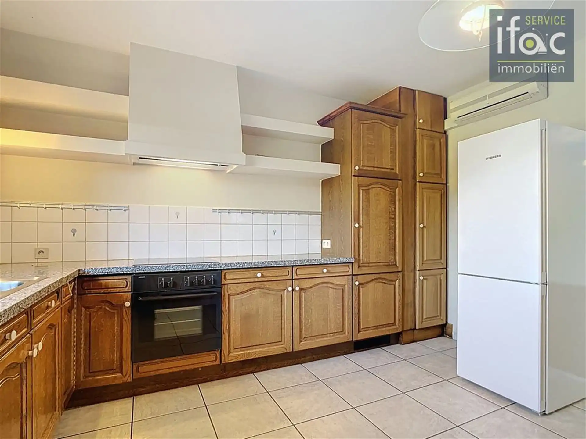 Ruim en klassevol gelijkvloers-appartement met 3 slaapkamers foto 7