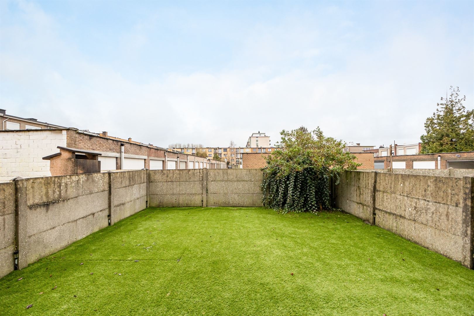 Gelijkvloers appartement met leuke tuin en garagebox foto 9