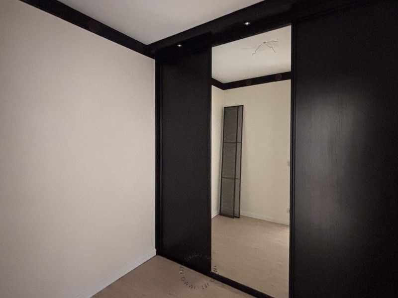 Ruim energiezuinig appartement met 2 slaapkamers en garage te Beveren foto 11