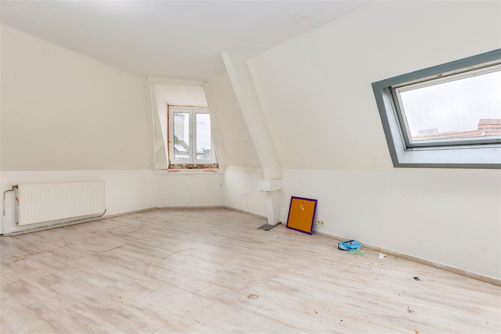 Hoekpand bestaande uit handelsglvl + 6 appartementen foto 12
